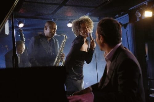 Jazz musicians performing in the club.